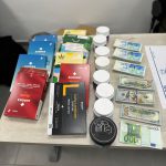 הכסף והסמים שנתפסו. צילום: דוברות המשטרה